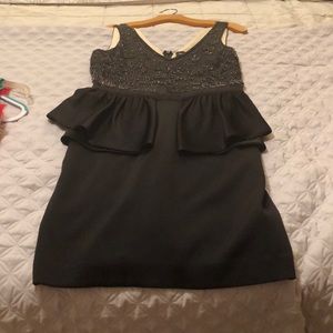 Black mini dress with sequin top.